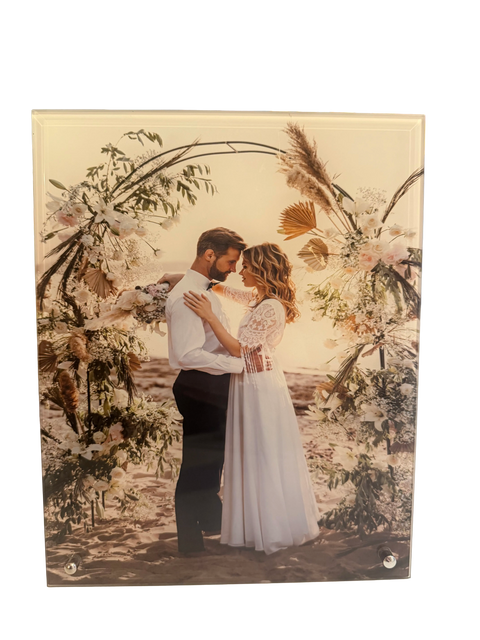 Personalised glass photo display showing a wedding photograph